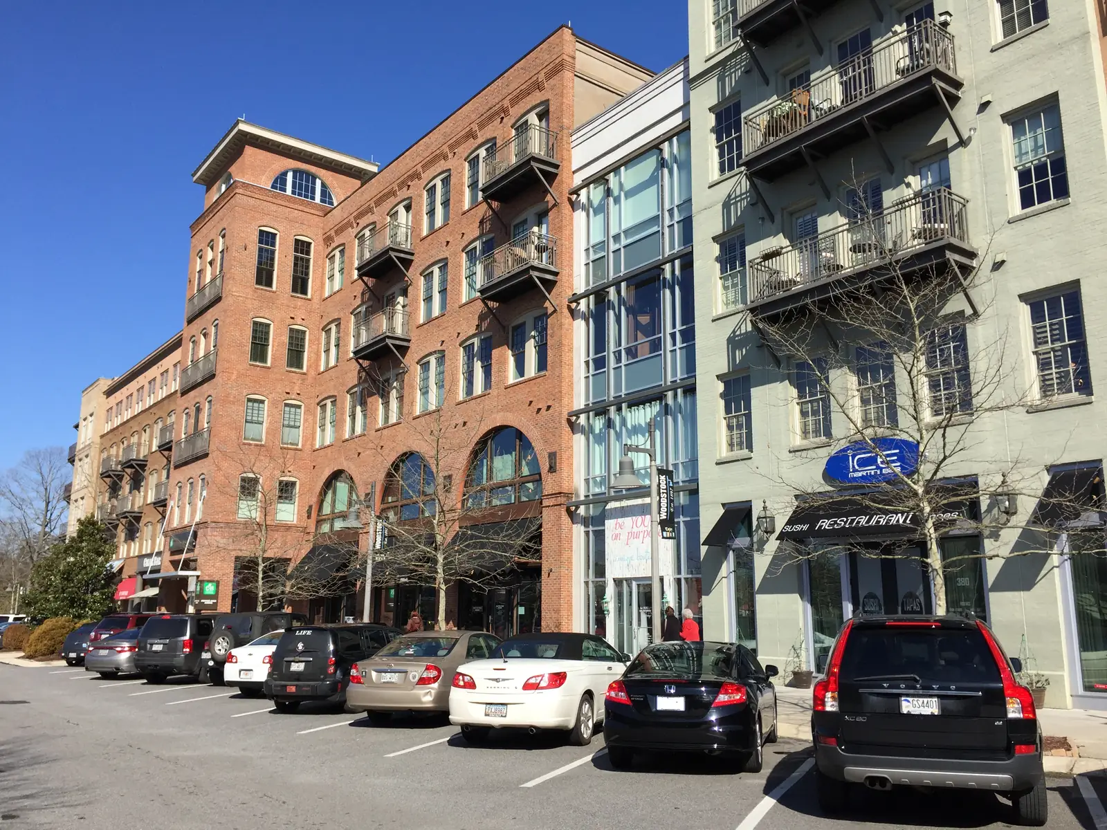 Apartment buildings with balconies above shops in downtown Woodstock
