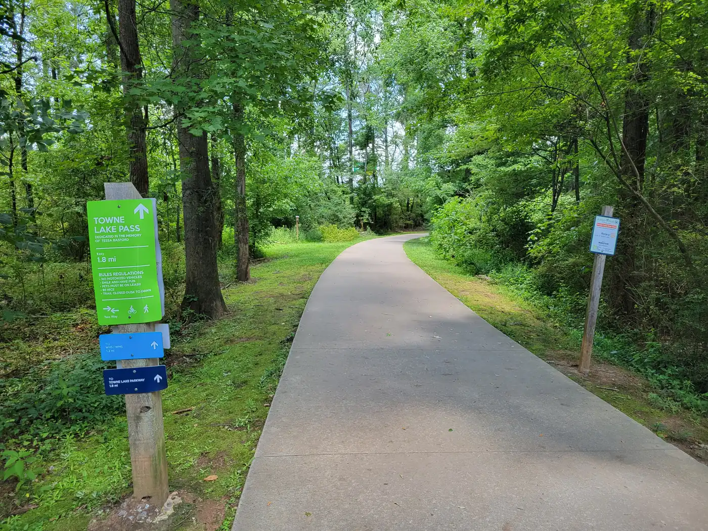 A Towne Lake Pass trail sign in Woodstock, part of the city's Greenprints trail system