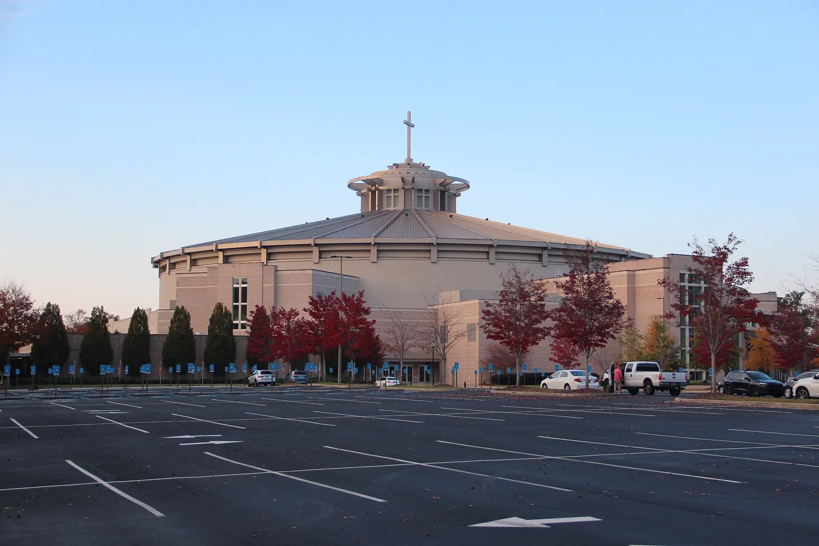 First Baptist Church Woodstock with fall color in its parking lot